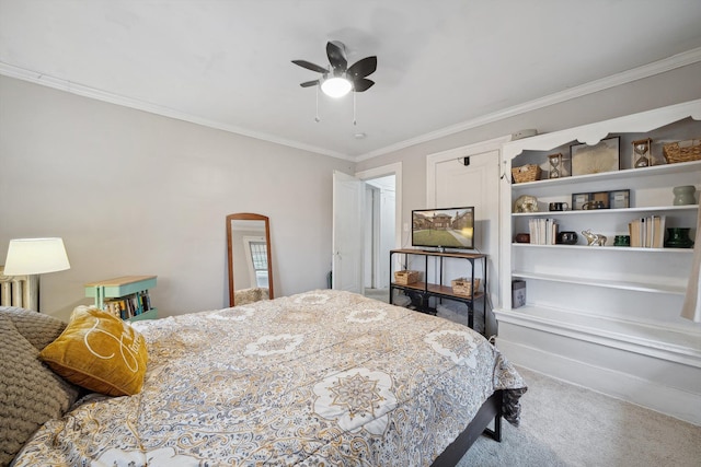 bedroom with carpet flooring, ceiling fan, and crown molding