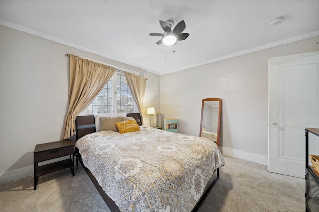 bedroom with carpet, ceiling fan, and ornamental molding