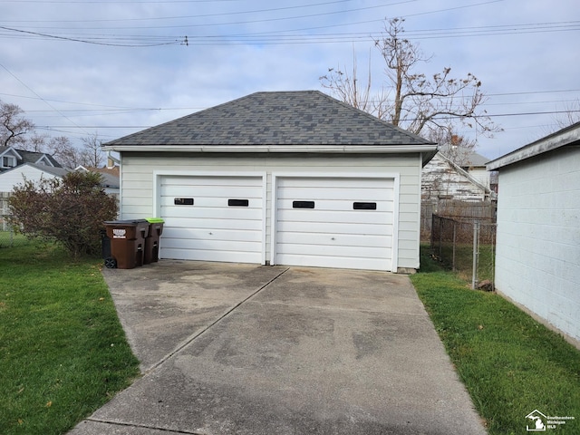 garage with a yard