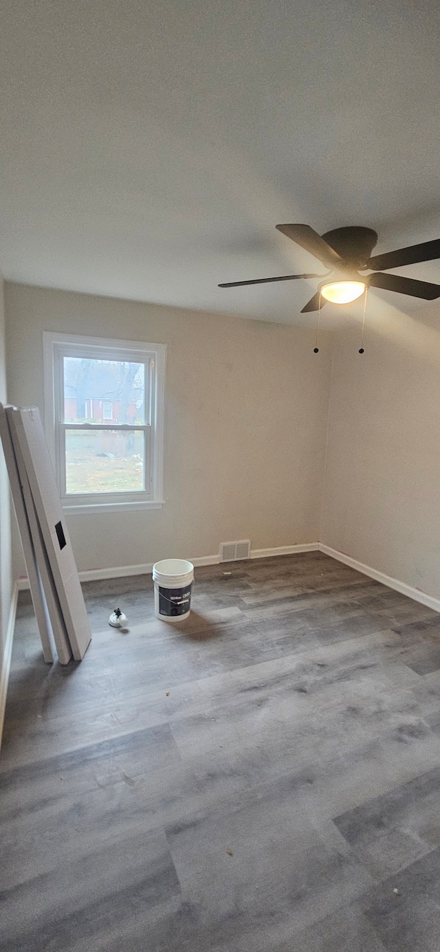 carpeted empty room with a textured ceiling