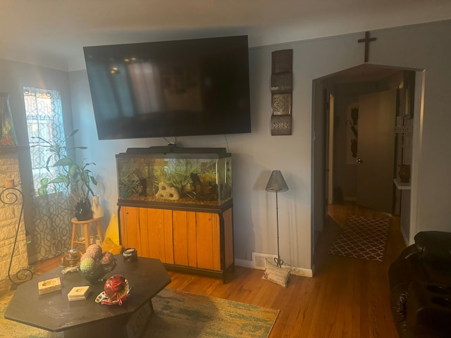 living room with light hardwood / wood-style floors