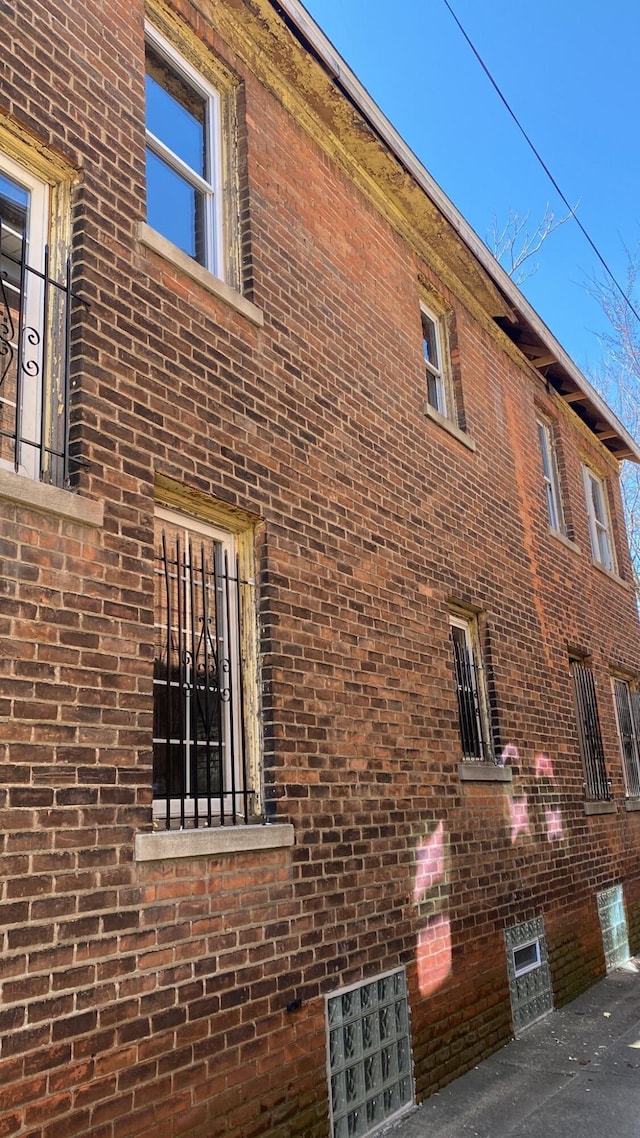 view of property exterior with a patio