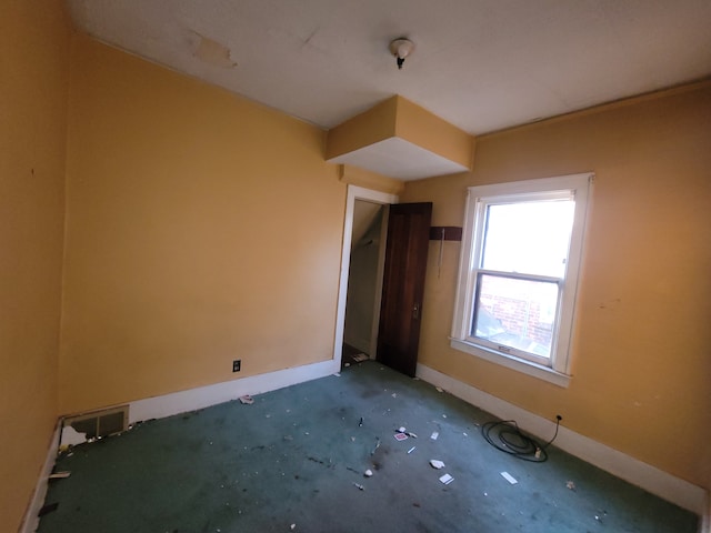 unfurnished bedroom with carpet flooring