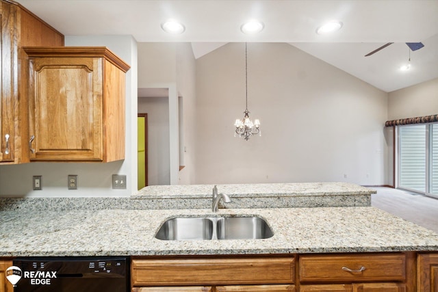 kitchen featuring light stone counters, ceiling fan with notable chandelier, sink, black dishwasher, and lofted ceiling