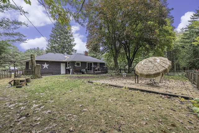 view of yard with a wooden deck