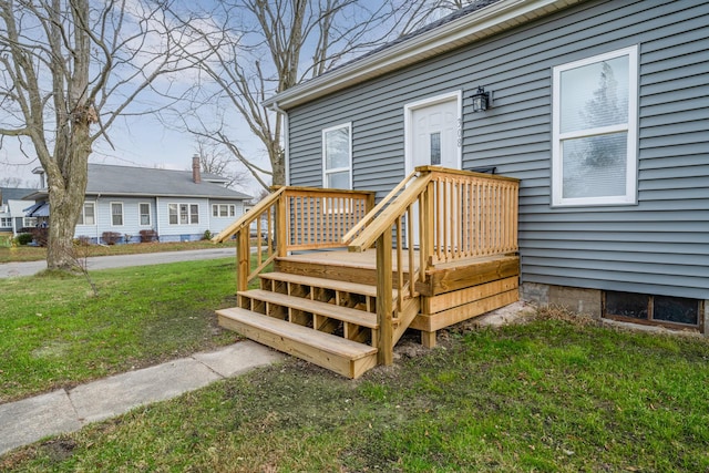 308 N Elm St, Three Oaks, MI 49128 - wooden deck featuring a yard