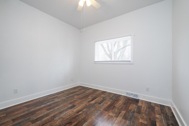 308 N Elm St, Three Oaks, MI 49128 - spare room featuring dark wood-type flooring and a ceiling fan