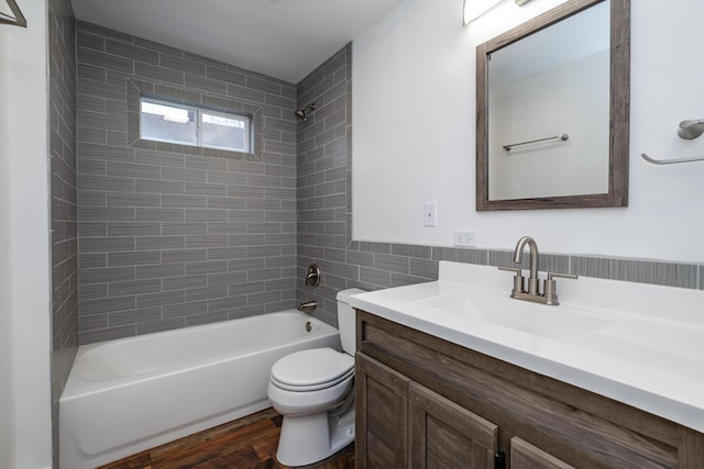 308 N Elm St, Three Oaks, MI 49128 - full bathroom featuring vanity, tub / shower combination, and wood finished floors