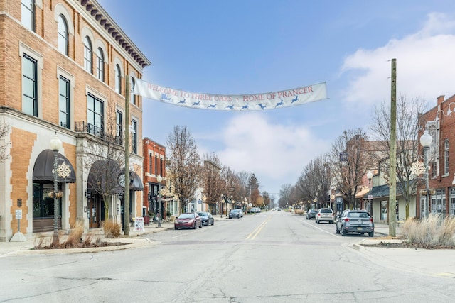 308 N Elm St, Three Oaks, MI 49128 - view of asphalt street with curbs, sidewalks, a residential view, and street lighting