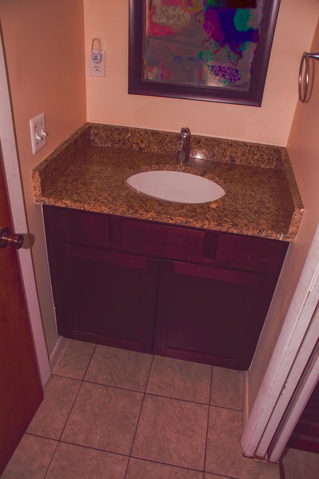 bathroom featuring vanity and tile patterned flooring