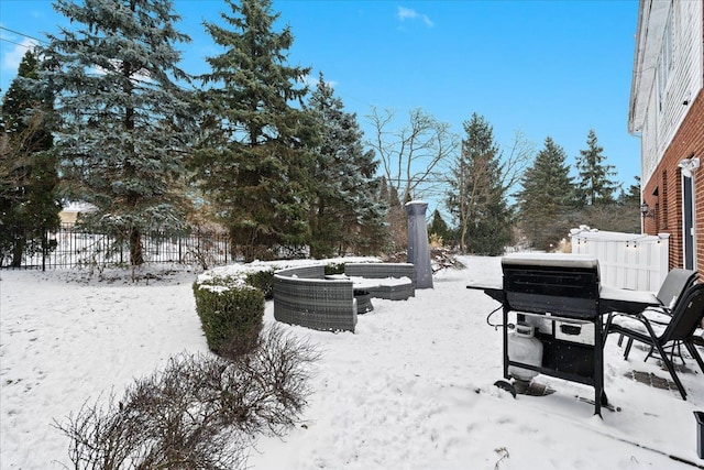 view of yard covered in snow