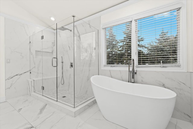 bathroom with separate shower and tub and vaulted ceiling