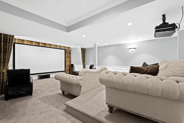 cinema room featuring carpet floors and crown molding