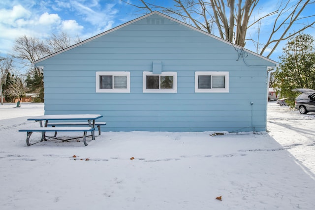 view of snow covered property