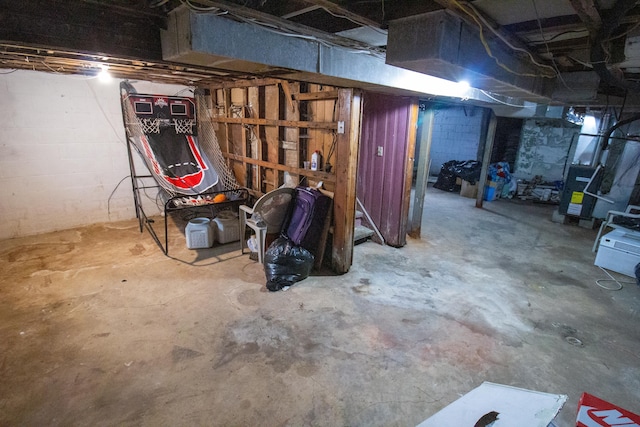 basement featuring heating unit