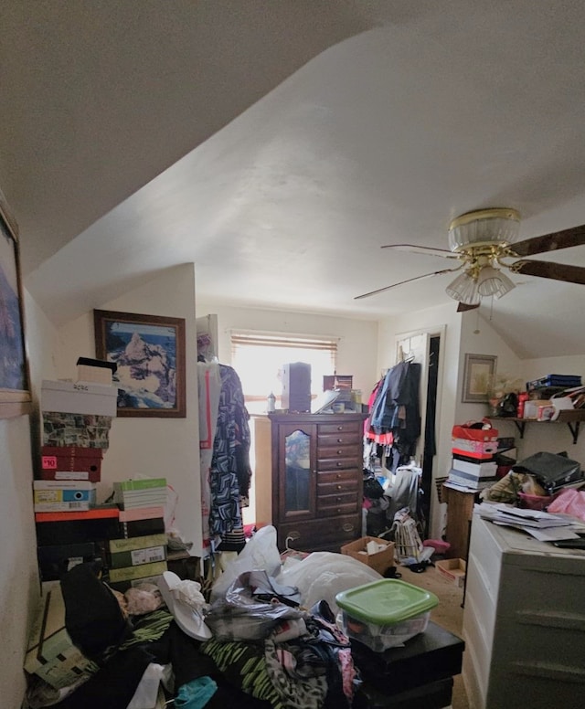 bedroom with ceiling fan and lofted ceiling