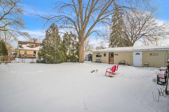 view of yard covered in snow