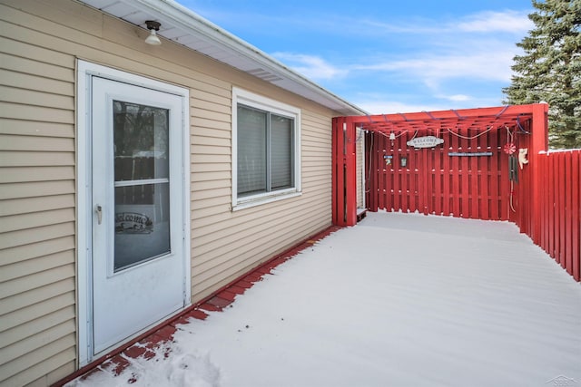 view of snow covered patio