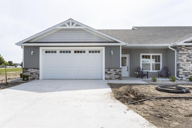 single story home featuring a garage