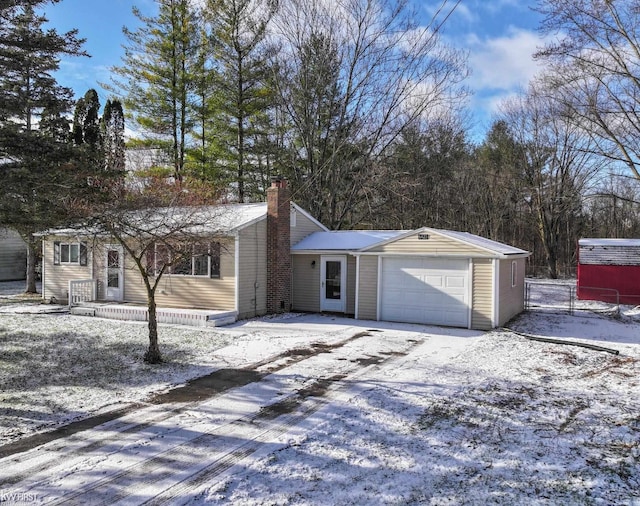 single story home featuring a garage