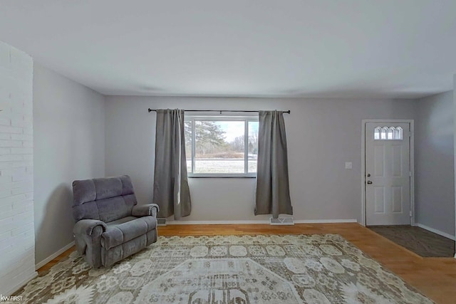 sitting room featuring light wood-type flooring