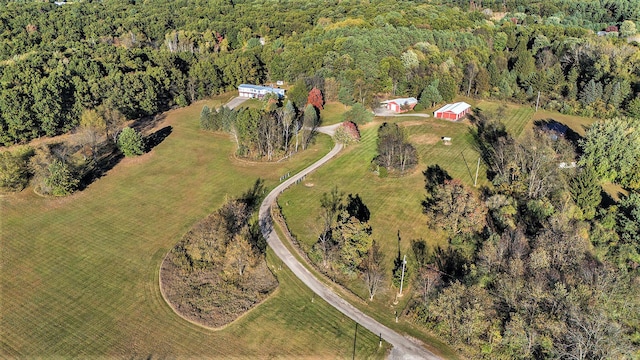 birds eye view of property with a rural view