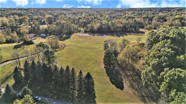 birds eye view of property with a rural view