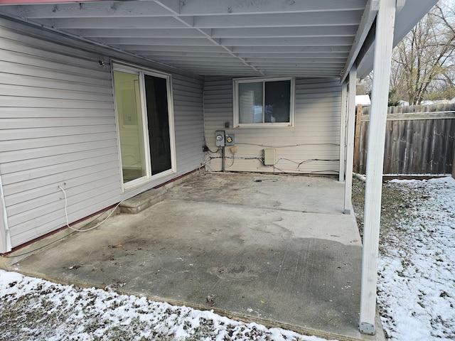 view of snow covered patio