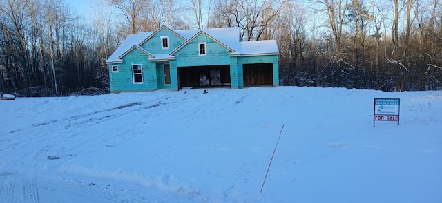 property under construction with a garage