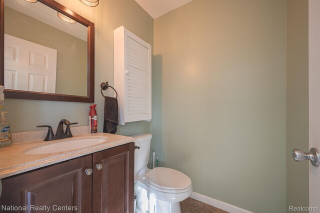 10040 Old Farm Trl, Davisburg, MI 48350 - half bath featuring vanity and tile patterned flooring