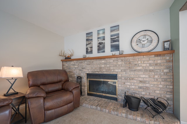 living room featuring carpet flooring and a fireplace