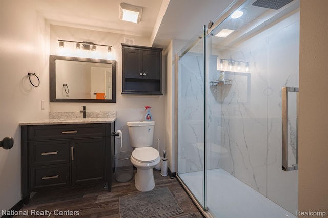 10040 Old Farm Trl, Davisburg, MI 48350 - full bathroom featuring a marble finish shower, vanity, and wood finished floors