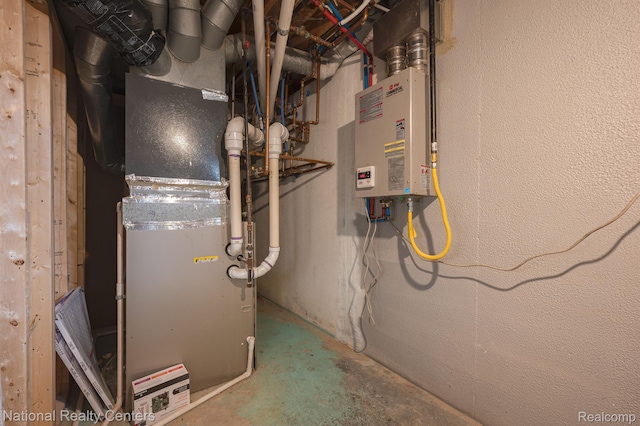 10040 Old Farm Trl, Davisburg, MI 48350 - utility room with heating unit and tankless water heater