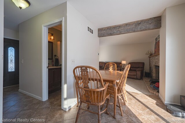 10040 Old Farm Trl, Davisburg, MI 48350 - dining area with a brick fireplace