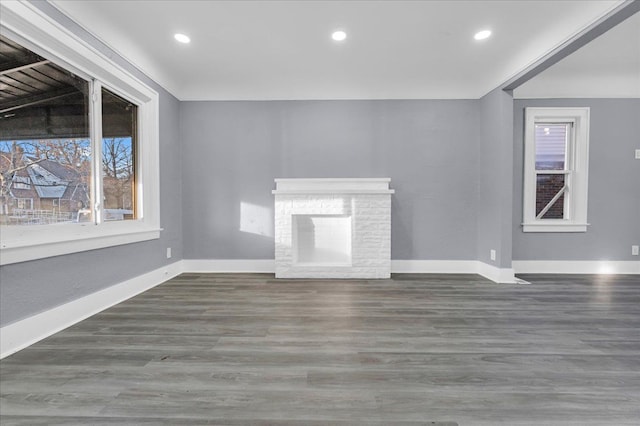 16148 Roselawn St, Detroit, MI 48221 - unfurnished living room with wood finished floors, recessed lighting, and a fireplace