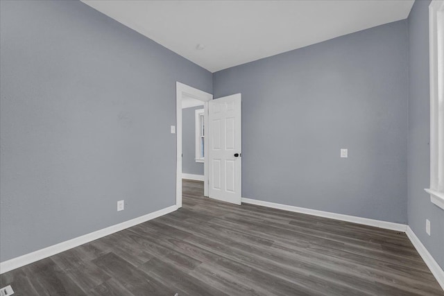 16148 Roselawn St, Detroit, MI 48221 - empty room with dark wood finished floors