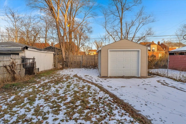 16148 Roselawn St, Detroit, MI 48221 - snow covered garage featuring a detached garage