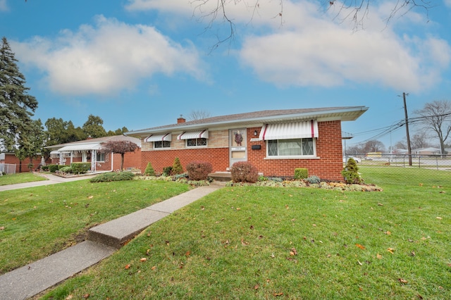 view of front facade with a front lawn