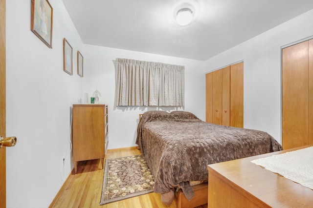 bedroom featuring light hardwood / wood-style floors