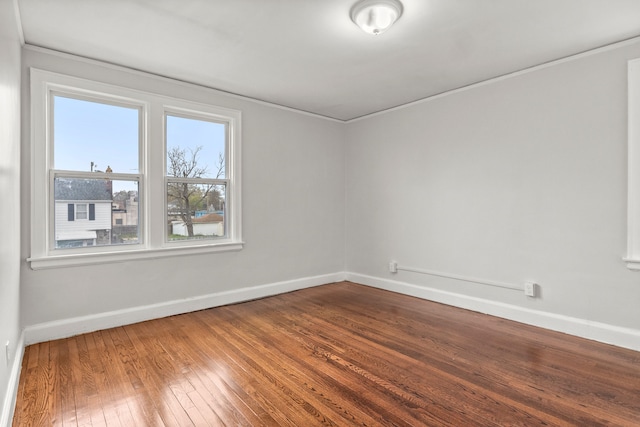 empty room with wood-type flooring