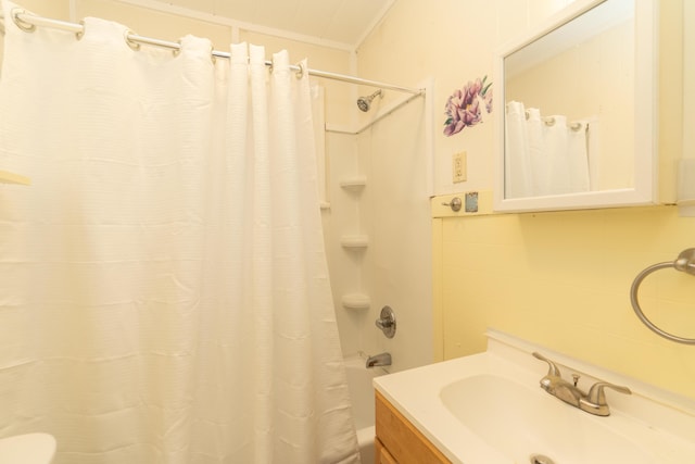 full bathroom with a sink and shower / bathtub combination with curtain