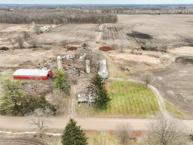 birds eye view of property featuring a rural view