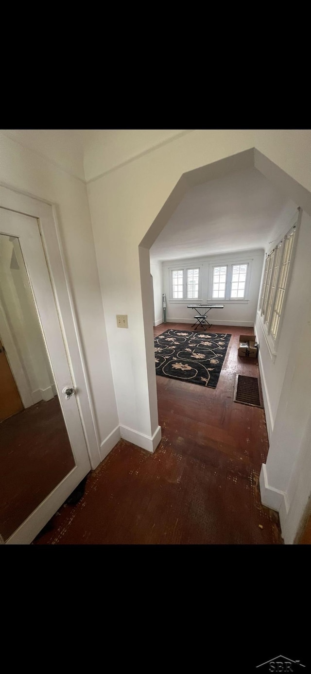 hall featuring dark hardwood / wood-style floors