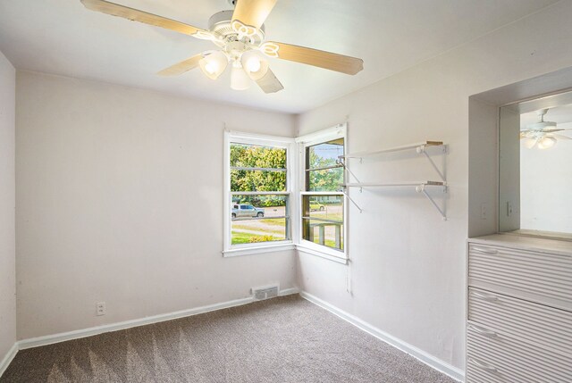 3085 S Center Rd, Burton, MI 48519 - unfurnished bedroom with carpet flooring and ceiling fan