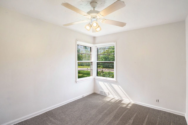 3085 S Center Rd, Burton, MI 48519 - spare room with carpet floors and a ceiling fan