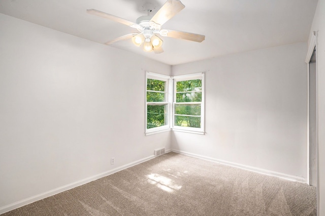 3085 S Center Rd, Burton, MI 48519 - carpeted empty room with baseboards and ceiling fan