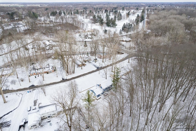 snowy aerial view featuring a rural view