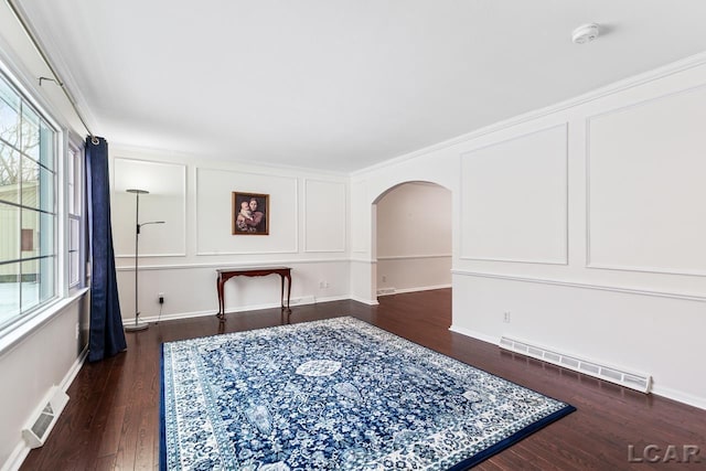 sitting room featuring dark wood-type flooring