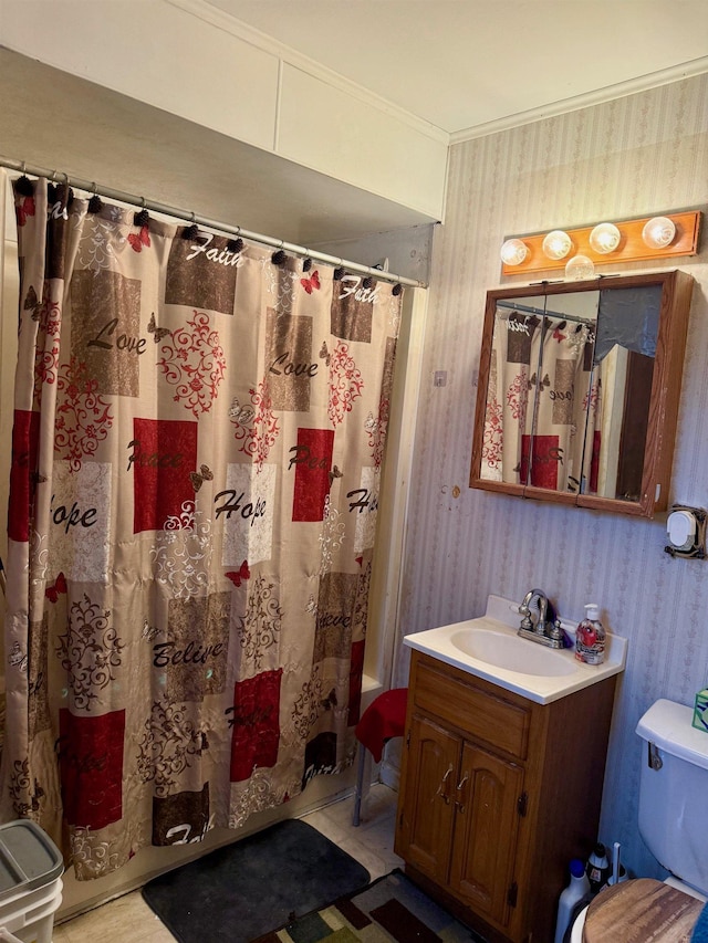 full bathroom with vanity, shower / bath combination with curtain, toilet, and ornamental molding