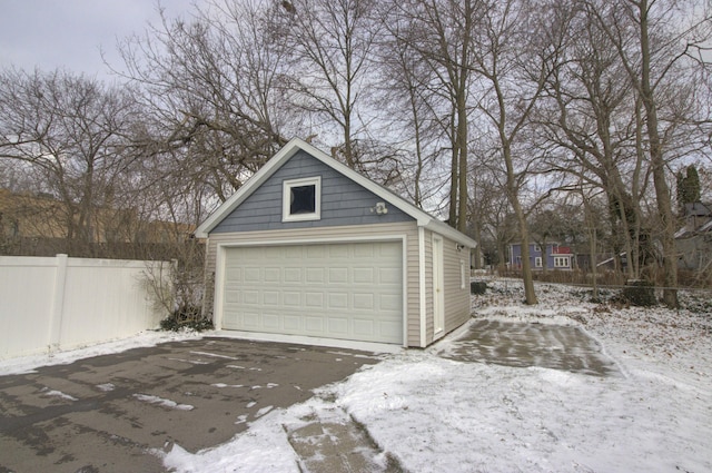 view of snow covered garage